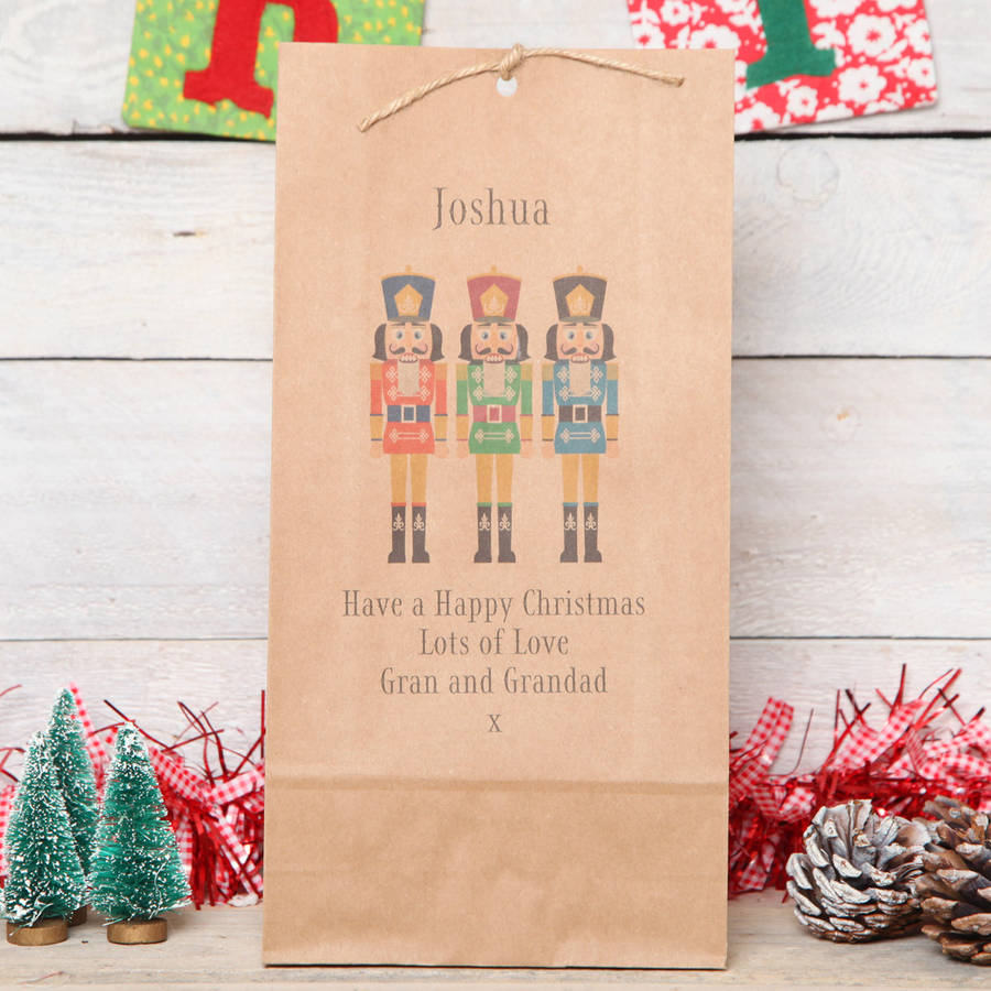 personalised nutcracker christmas gift bag by red berry apple ...