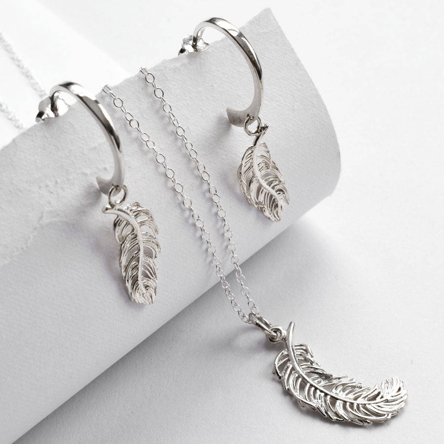 silver feather jewellery set by lily charmed