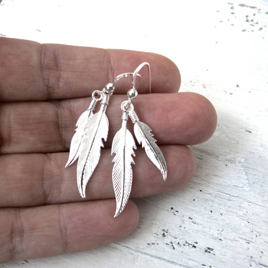 silver feather earrings by gaamaa
