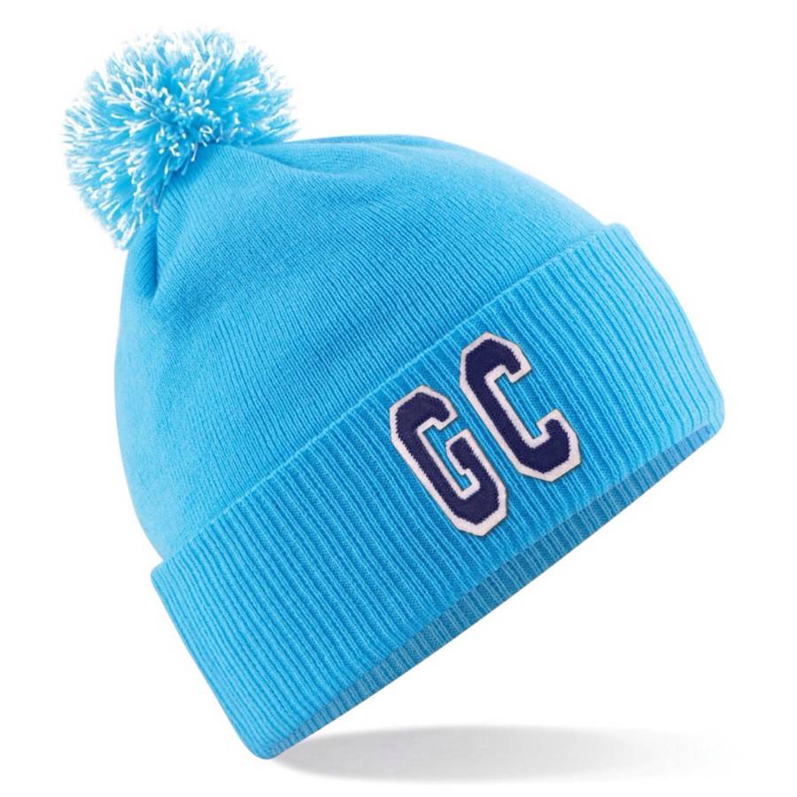 personalised blue bobble hat with initials by pink pineapple home