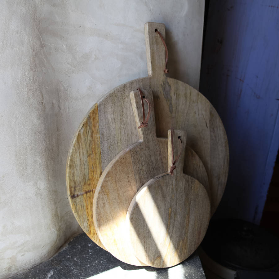 mango wood pizza board by nkuku