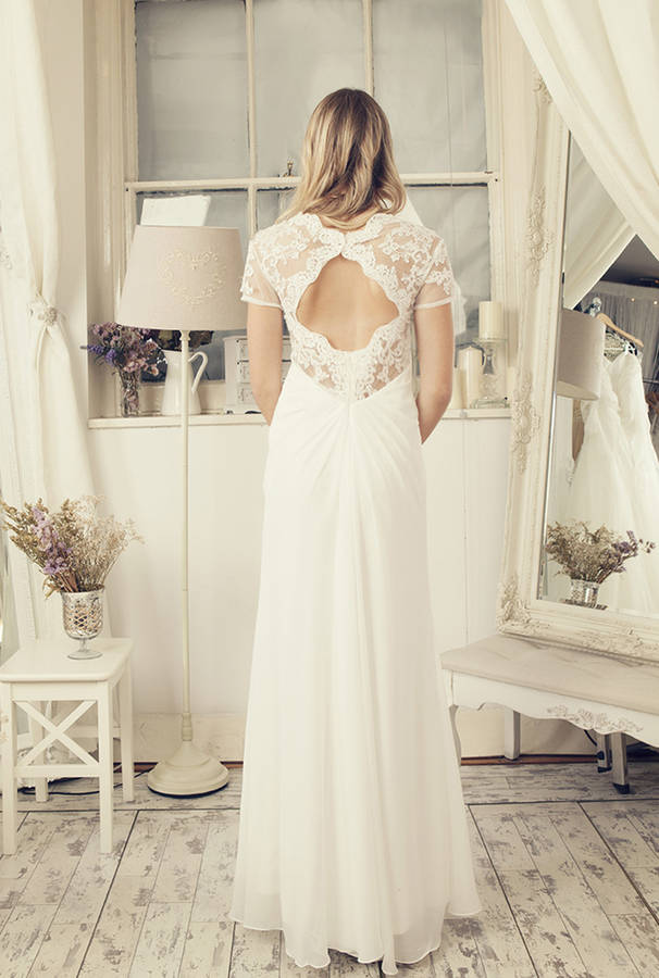 Lace cap sleeves in ivory wedding dress