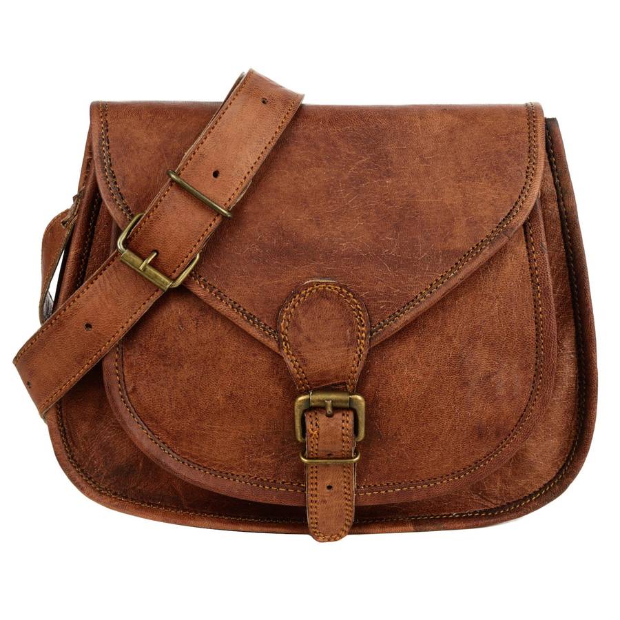 curved brown leather saddle bag by paper high | notonthehighstreet.com