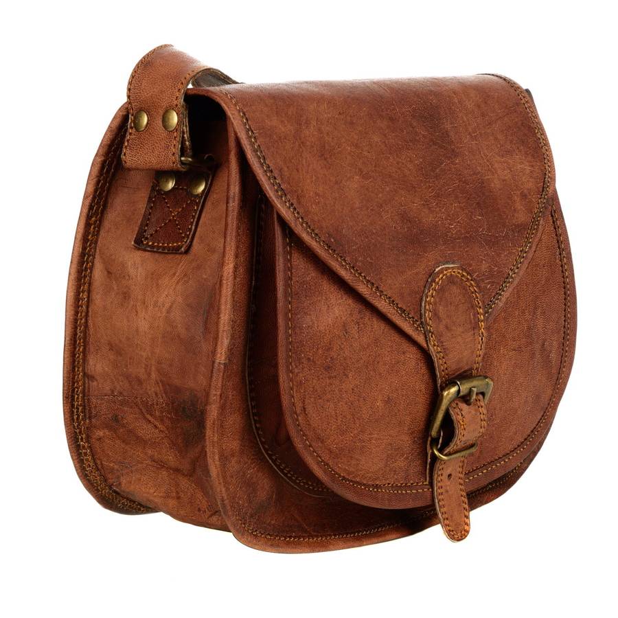 curved brown leather saddle bag by paper high | notonthehighstreet.com