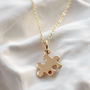 Solid 9ct Gold Jigsaw Puzzle Necklace With Ruby, thumbnail 1 of 4