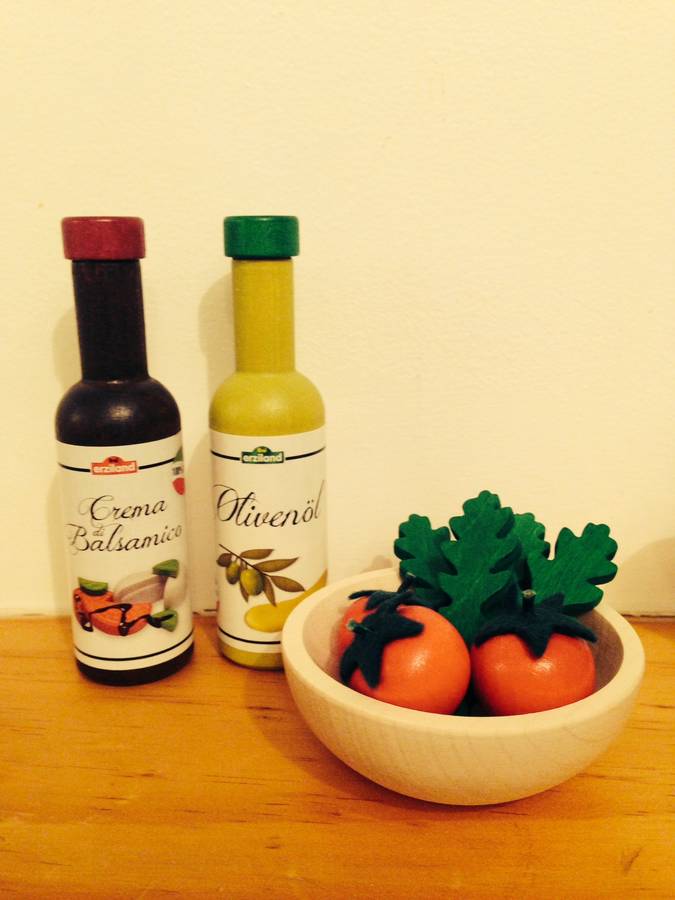 wooden bottles of olive oil and balsamic vinegar by tribe of five