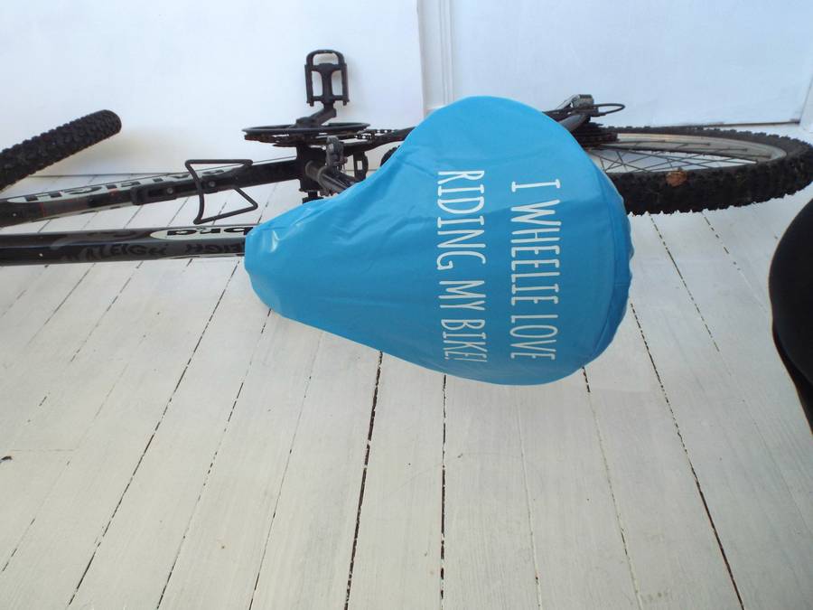 'wheelie love' bike seat rain cover by kelly connor designs