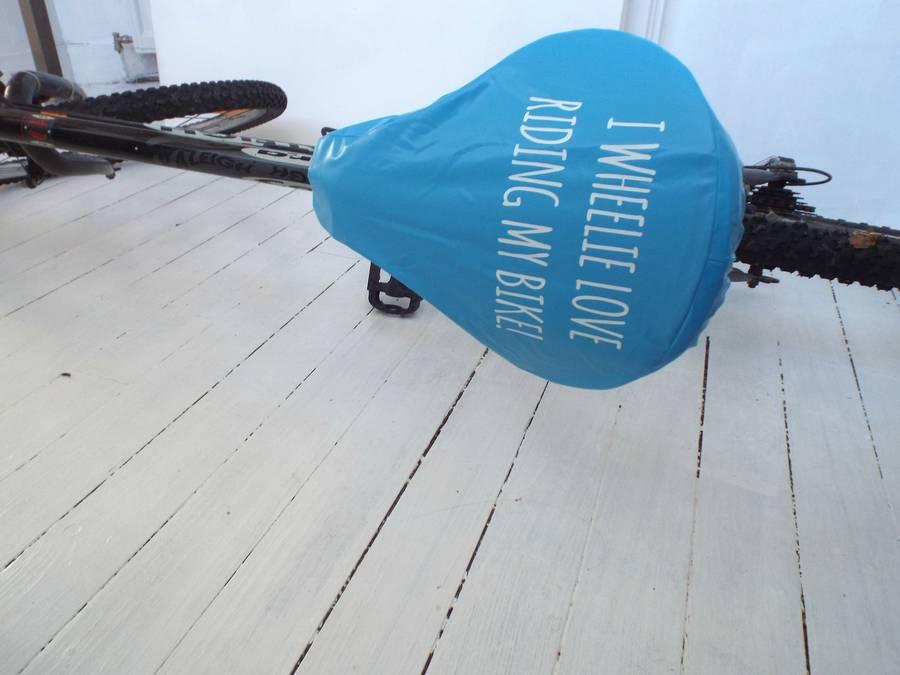 'wheelie love' bike seat rain cover by kelly connor designs