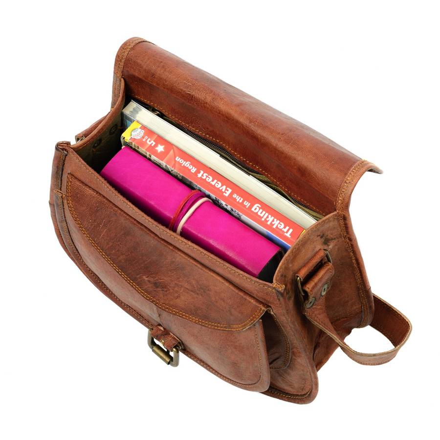 curved brown leather saddle bag by paper high