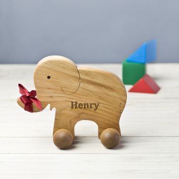Personalised Wooden Baby Elephant On Wheels, 2 of 3