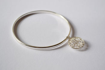 Silver Bangle With Circular Pillow Charm, 3 of 3