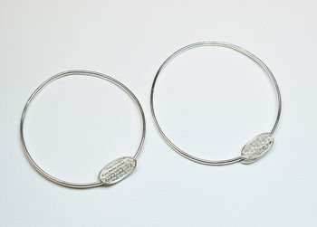 Silver Bangle With Oval Pillow Charm, 2 of 3