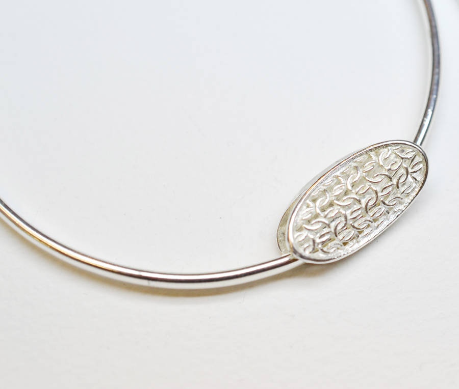 Silver Bangle With Oval Pillow Charm By Kate Holdsworth Designs