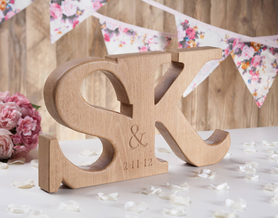 carved oak wedding letters by house of carvings | notonthehighstreet.com