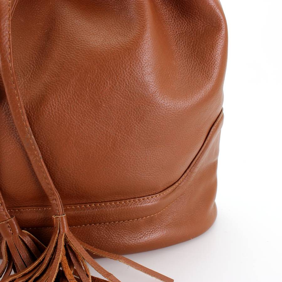 tan leather drawstring handbag by the leather store
