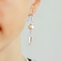 Sterling Silver Pearl And Feather Dangly Earrings, thumbnail 1 of 5