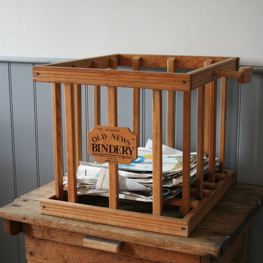 wooden newspaper storage by homestead store
