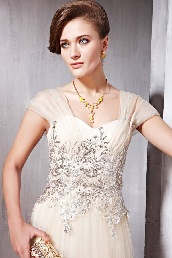 is it ok to wear champagne to a wedding
